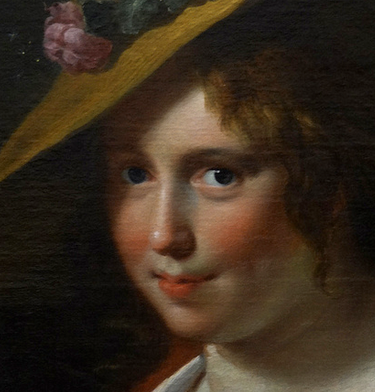 painting of woman's head with red cheeks