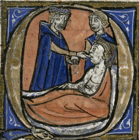 historiated initial with doctor holding something to patient's face