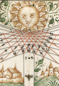 decorative sundial with eye-rolling sun